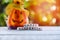 Scarecrow halloween background with word blocks happy halloween decorations and pumpkin jack o lantern funny spooky on wooden