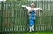 Scarecrow hanging on fence