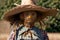 A Scarecrow Wearing A Straw Hat And A Scarecrow Costume. Generative AI