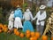 Scarecrows in a pumpkin patch