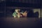 Scared Boy Sleeping Under his Bed with Teddy Bear