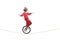 Scared clown riding a unicycle on a rope