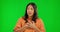 Scared, face and a woman with fear on a green screen isolated on a studio background. Stress, anxiety and portrait of a