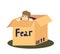 Scared man hiding in cardboard box depressed and frightened. Fear and anxiety concept