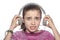 Scared teenager girl with headphones