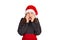 Scared woman looks nervously, biting fingernails and afraid of something. emotional girl in santa claus christmas hat isolated on