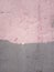 Scarlet pink paint old cracked concrete background, cement wall