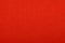 Scarlet red felt background texture close up