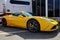 Scarperia Florence, Italy - March 2018 : Yellow Ferrari car 458 Italia on display in the Mugello paddock.