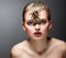 Scary Arachnid Predator on Beauty Woman Face sitting