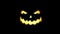 Scary glowing Halloween Pumpkin Eyes and Mouth on Black. Mouth starts laughing Animation - Spooky Cartoon Style