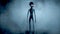 Scary gray alien walks and looks blinking on a dark smoky background. UFO futuristic concept. 3D rendering