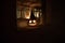 Scary Halloween pumpkin in the mystical house window at night or halloween pumpkin in night on room with blue window. Symbol of