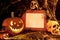 Scary halloween pumpkin, skull and the ghost with blank sign