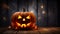 Scary halloween pumpkin on wooden planks In A Spooky At Night. Candle lit Halloween Pumpkins.