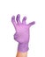 Scary hand in latex surgical gloved sign against white background. Hand in a purple latex glove isolated on white. Woman`s hand