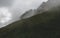 Scary hiking path on steep mountain. hiking path grass, brienzer rothorn switzerland