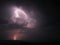 Scary lightning bolt into the night on storm