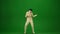 Scary mummy wrapped in bandages dances wearing a black hat and sunglasses. Green screen isolated chroma key. Mock up