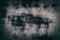 Scary mysterious abstract background with textured gray shabby rusty metal in horror style with strange light and