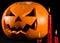 Scary pumpkin, jack lantern, pumpkin halloween, red candles on a black background, halloween theme, pumpkin killer