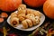 Scary sausage mummies in dough with funny eyes on table