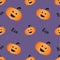Scary seamless pattern of orange pumpkins