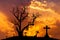 Scary silhouette dead tree and spooky silhouette crosses in mystic graveyard