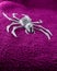 Scary Spider Skeleton  with white eyes on fluffy purple background. Concept for creepy Halloween