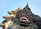 Scary stone barong mask at entrance to Tanah Lot, Bali