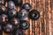 Scattered Blueberries on Rustic Wooden Background