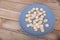 Scattered euro coins on a blue plate