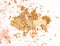 Scattered gold glitter eye shadow background.