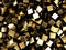 Scattered golden cubes chaotic background