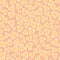 Scattered hand drawn doodle hearts in pastel yellow, pink and orange with loose scalloped edging. Seamless vector
