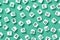 Scattered letter cubes on monochrome green background