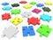 Scattered pieces of puzzles of different colors on a white