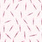 scattered pink paintbrushes seamless vector pattern