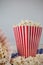 Scattered popcorn against white background