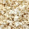 Scattered salted and cheese popcorn texture background