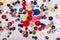 Scattered sewing button textured background assorted colors