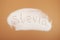 Scattered Stevia sweetener with inscription Stevia. Design element. Stevioside powder, natural sugar substitute. Food additive