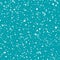 Scattered white ice particles or snowflakes on vibrant blue background. Seamless winter vector pattern. Great for