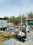 Scene and activity of fishing village`s boat park along the harbor