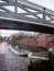 A scene along the canal in Birmingham City Centre. Photographed on a cold winter`s day with low grey clouds.