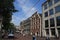 Scene of Amsterdam canal Singel with typical dutch houses and houseboats during morning blue hour, Holland, Netherlands. Used toni