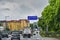 Scene on the Berlin A100 freeway with various vehicles at the start of rush hour traffic