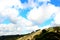 Scene from Casertavecchia with huge white clouds