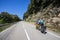 Scene of a couple of cyclists on tandem bicycle in La Garrotxa, Girona, Spain