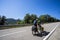 Scene of a couple of cyclists on tandem bicycle in La Garrotxa, Girona, Spain